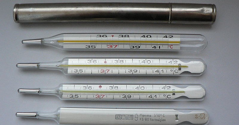 How long do you keep a mercury thermometer in your mouth
