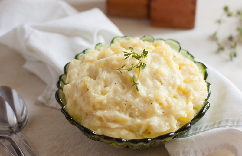 How many calories are in a serving size of mashed potatoes
