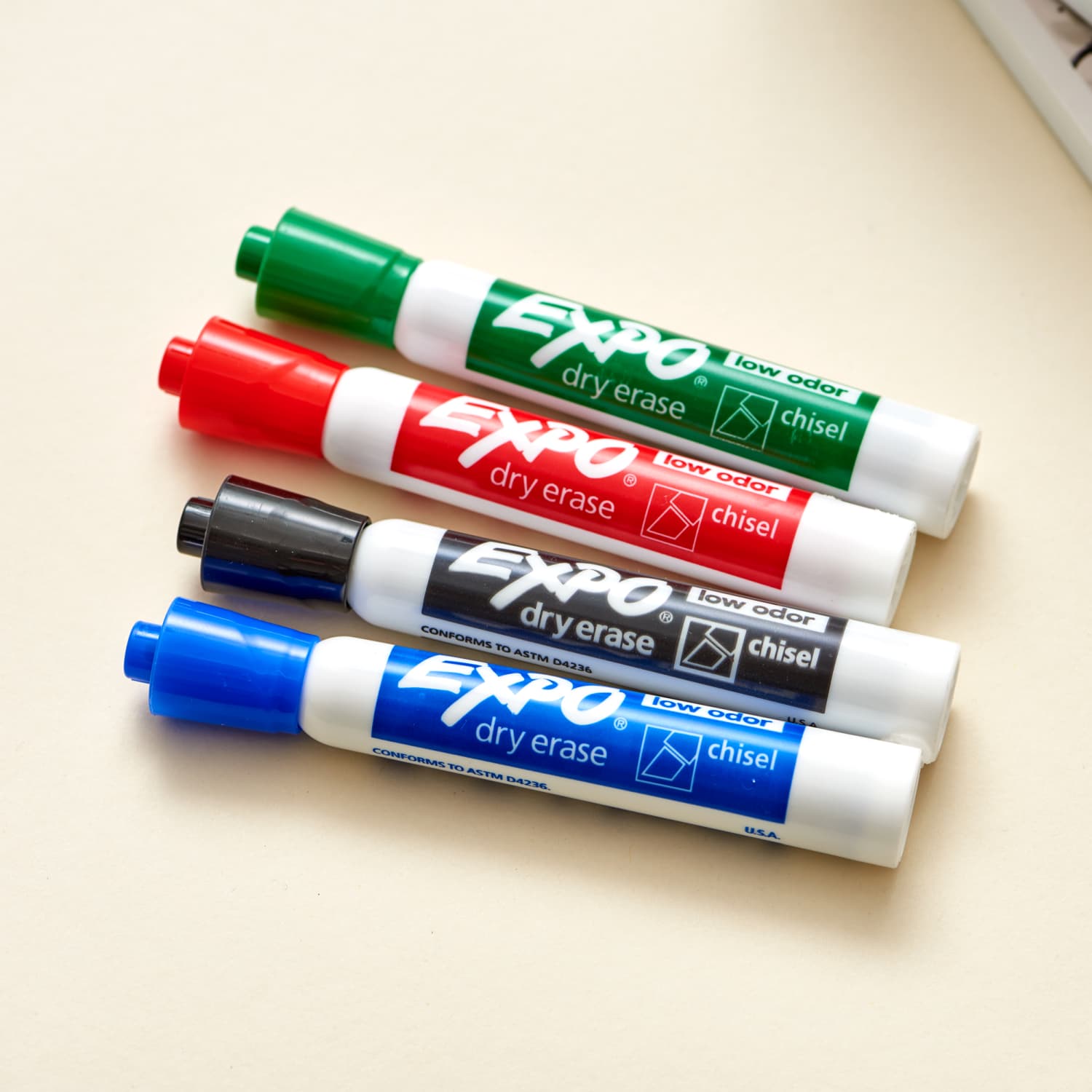 What kind of marker can you use on laminated paper?