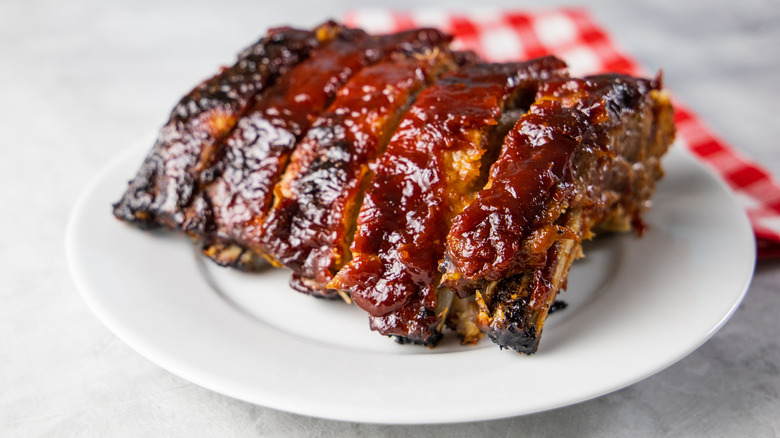 How do you heat up fully cooked ribs?